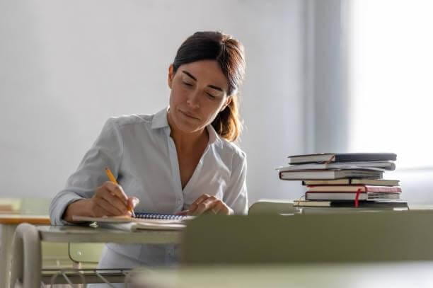 teacher-grading-her-students_001